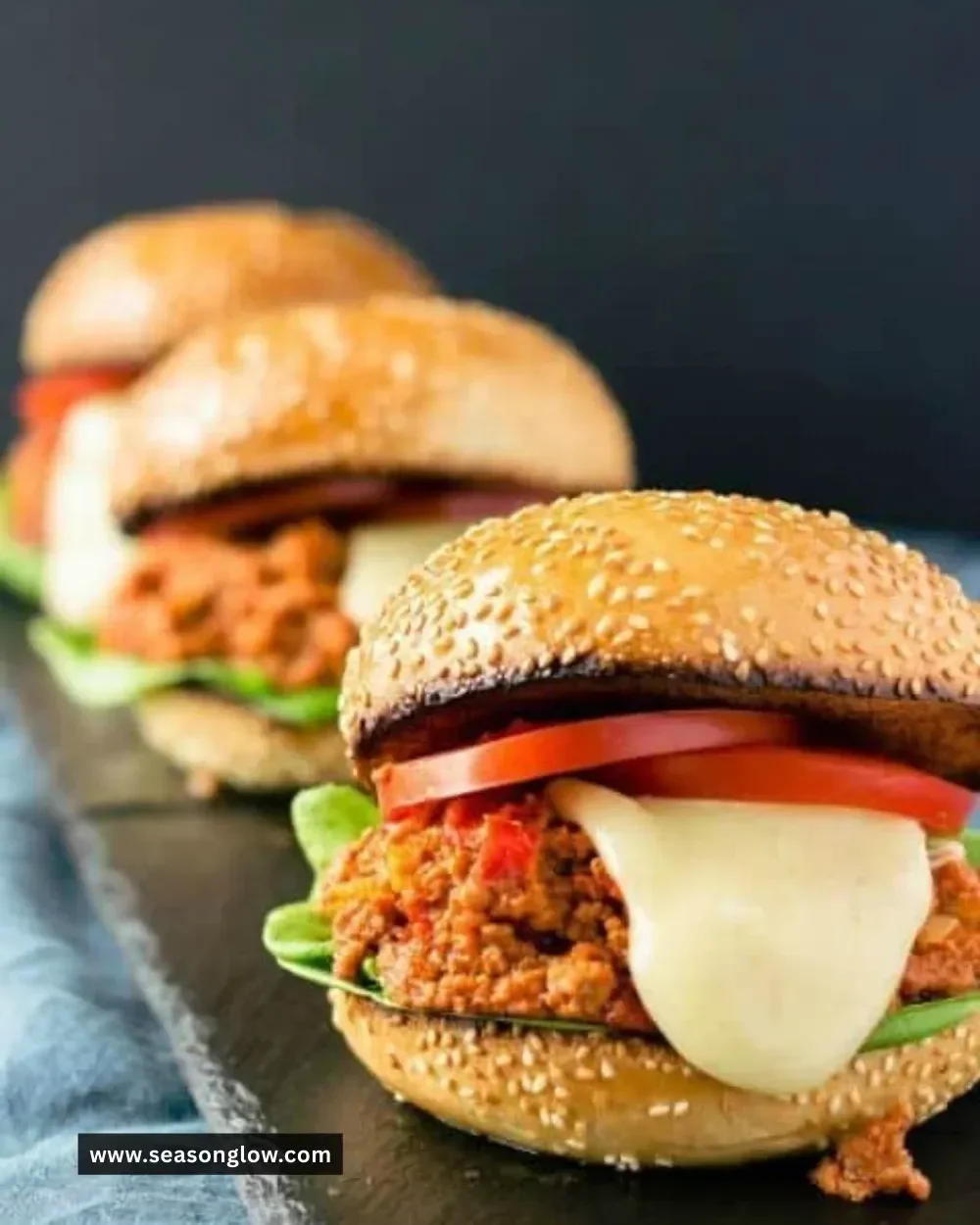Delicious Sloppy Joes Burgers served with fresh toppings