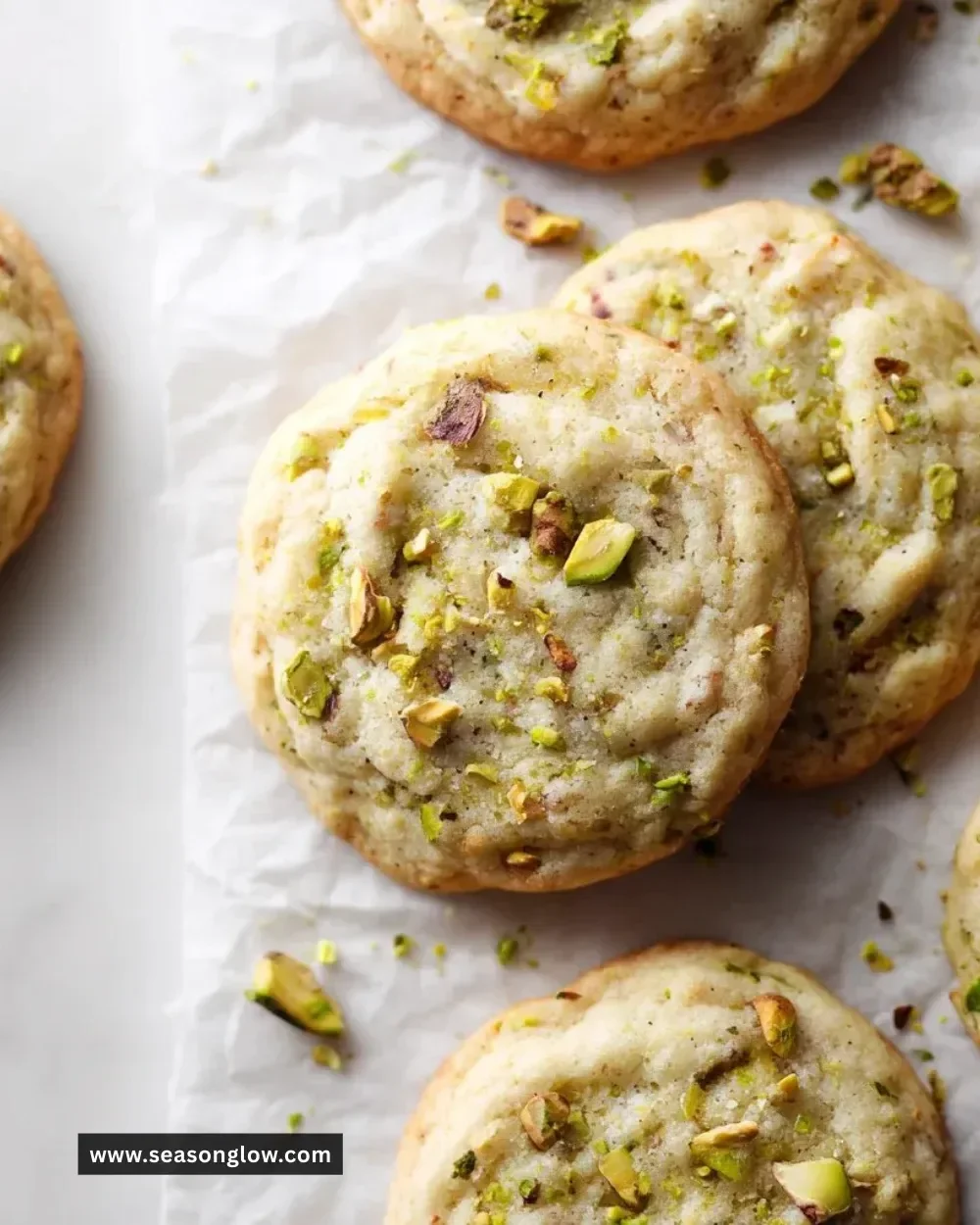 Soft and chewy pistachio pudding cookies topped with crushed nuts