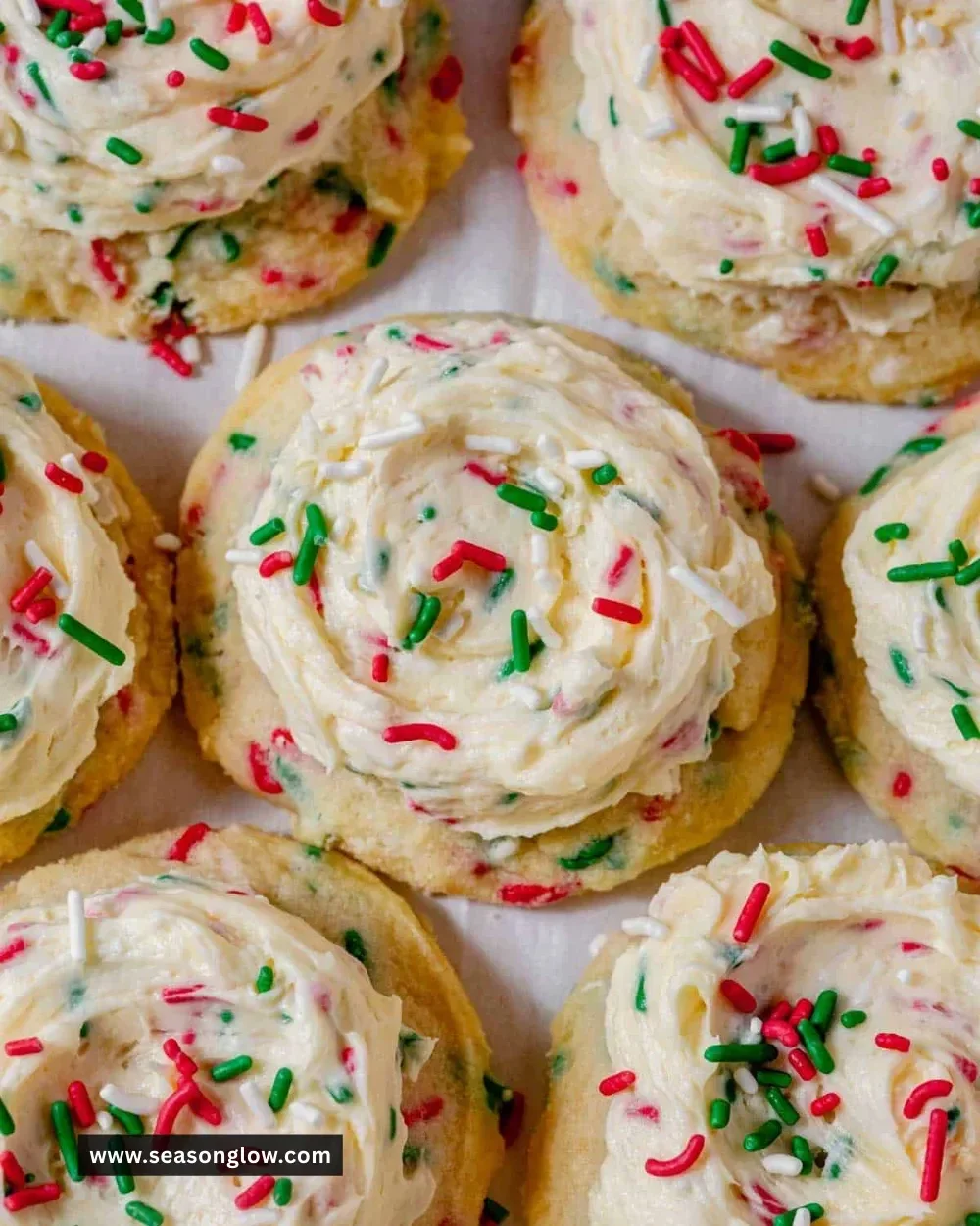Soft frosted Christmas cookies decorated with colorful icing for the holidays