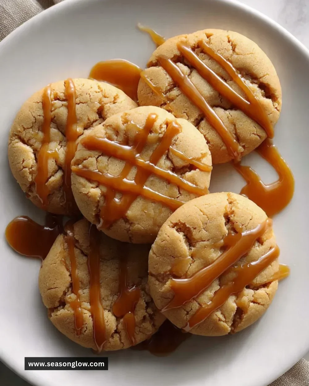 Delicious spicy caramel cookies on a rustic wooden table.