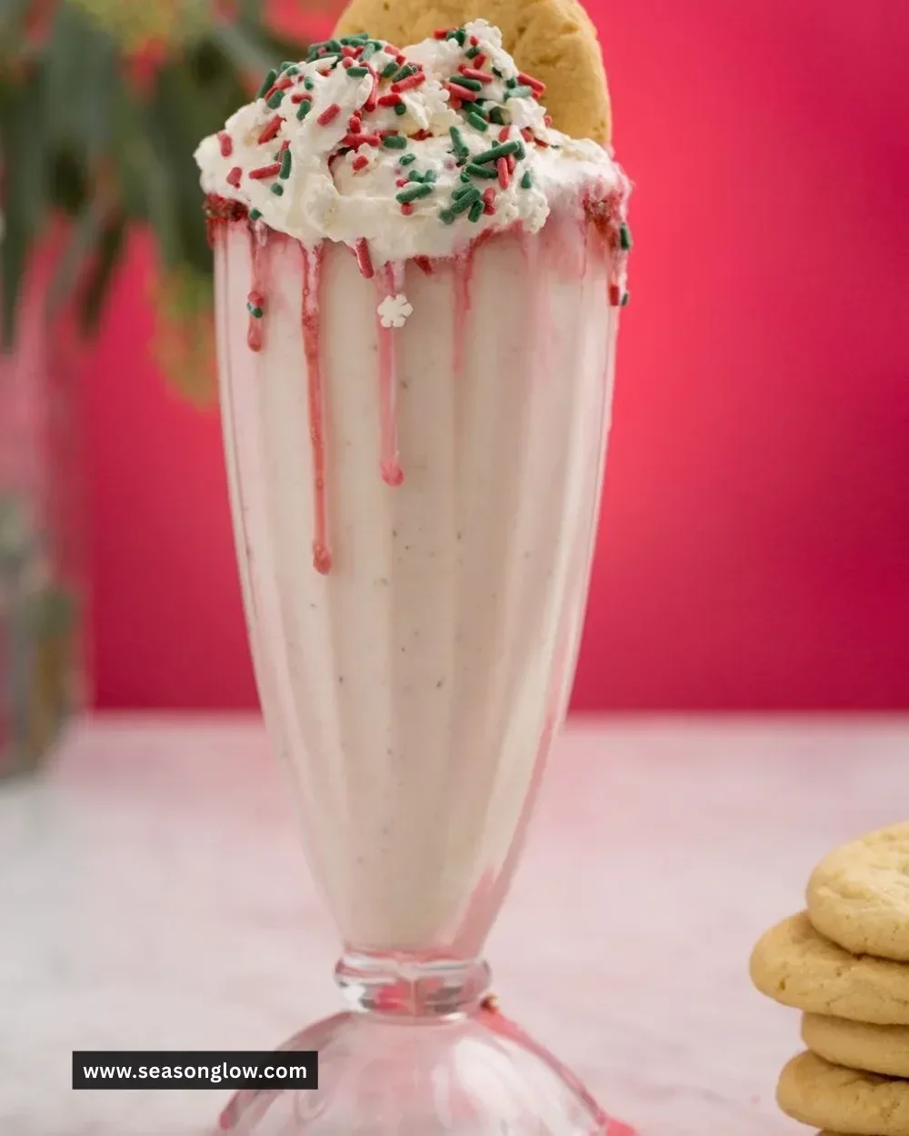 Delicious homemade sugar cookie milkshake in a glass with whipped cream