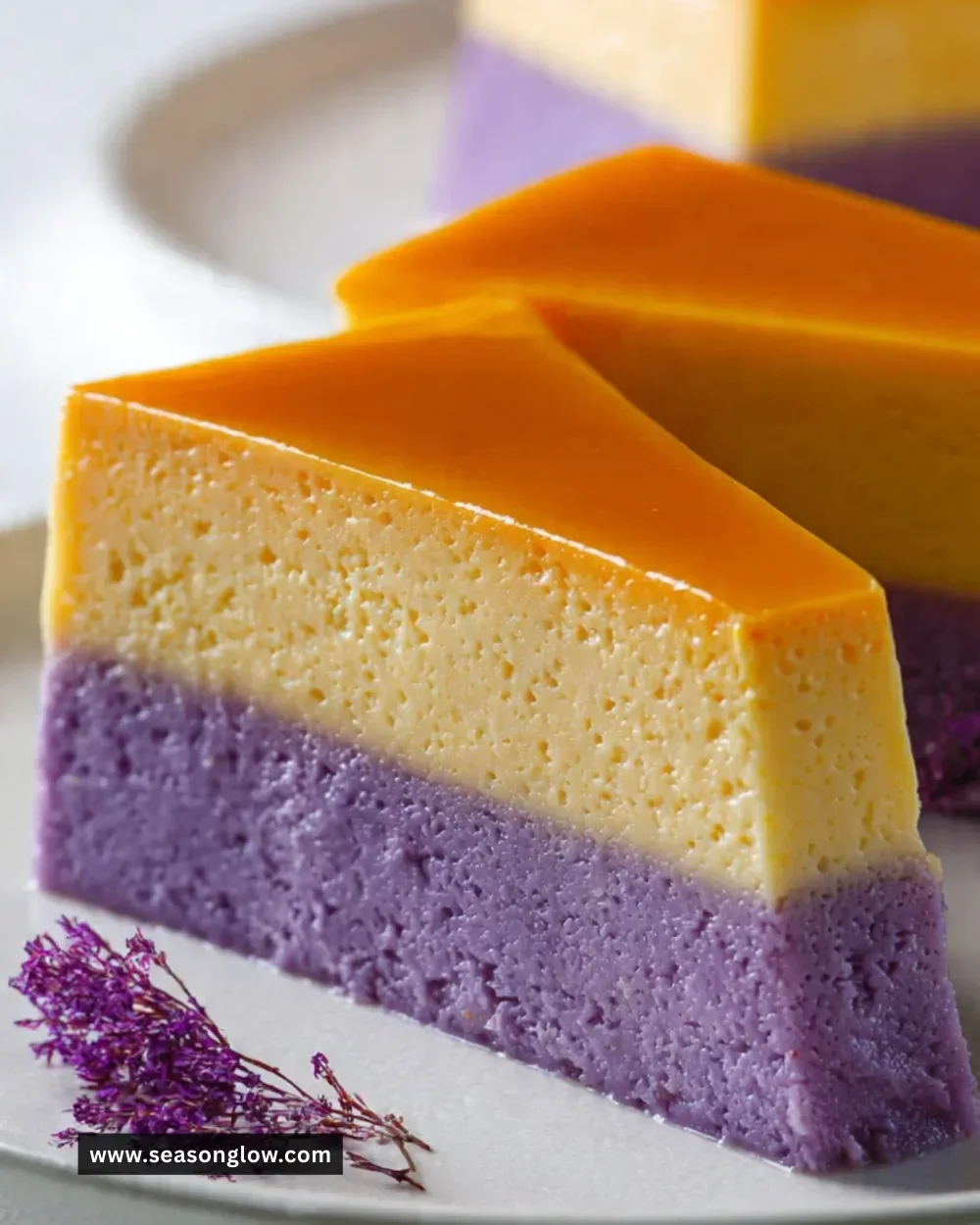 Delicious ube flan cake topped with purple ube and caramel sauce.
