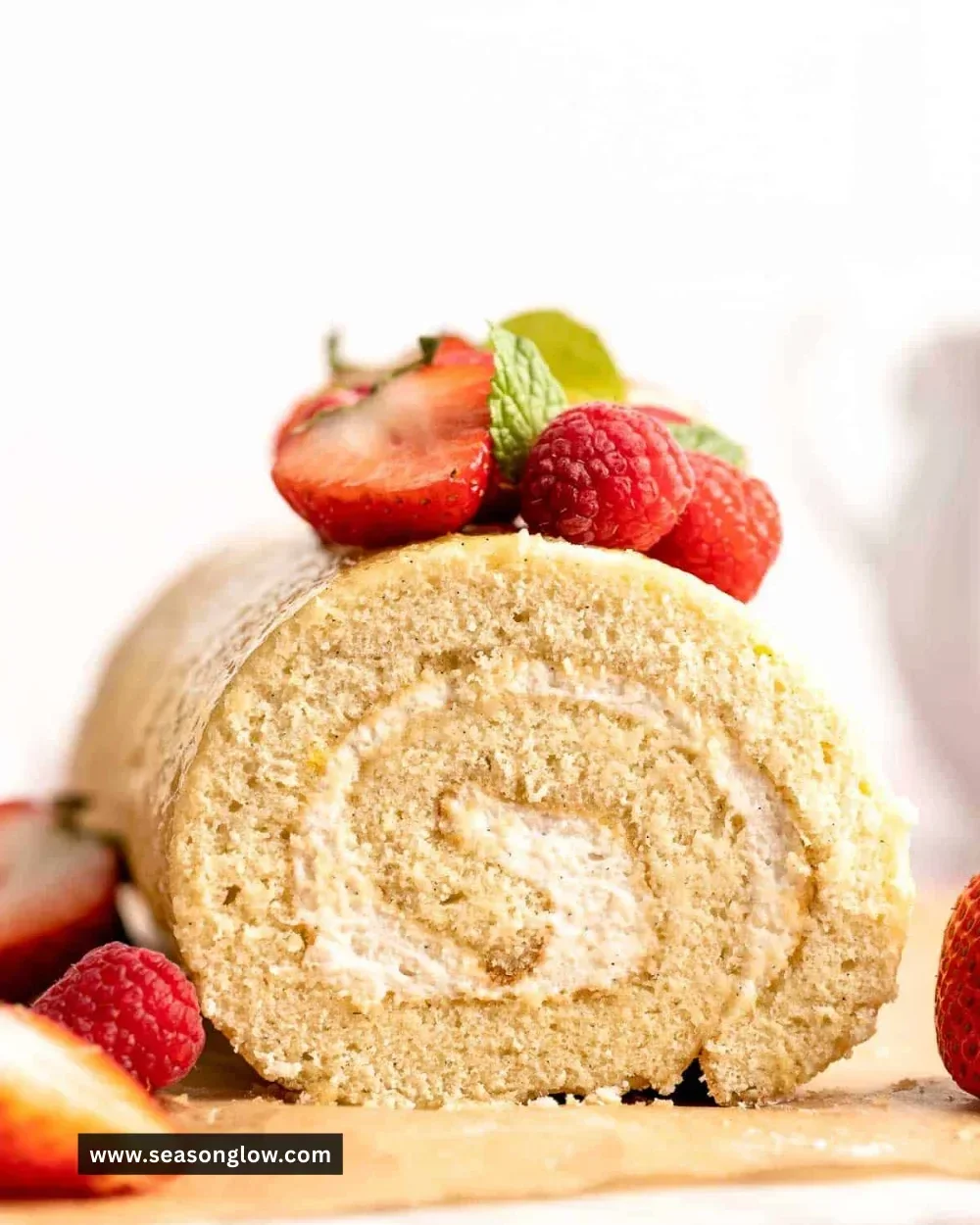 Delicious Vanilla Swiss Roll Cake with cream filling and a light sponge