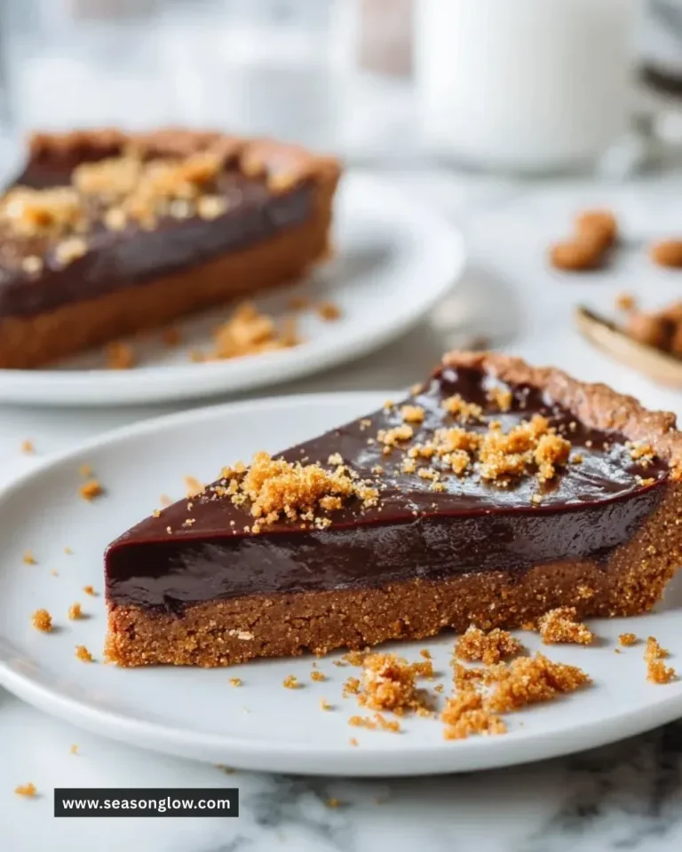Vegan Gingerbread Chocolate Tart with rich chocolate and spiced gingerbread crust