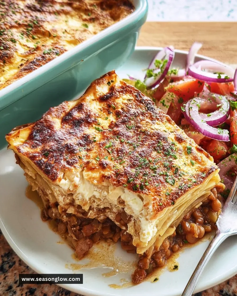 Delicious Vegetarian Pastitsio served in a dish with layers of pasta and vegetables