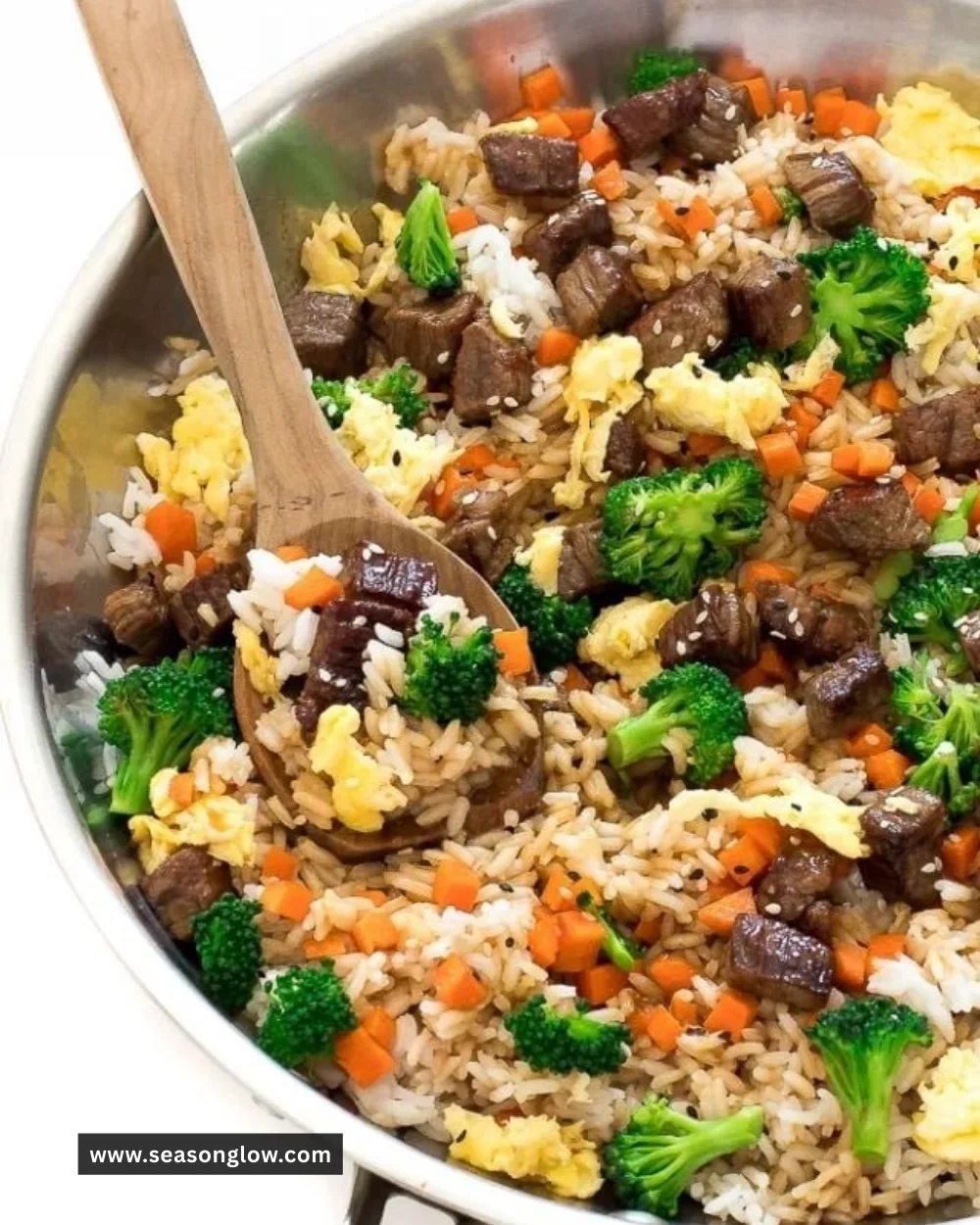 Plate of Beef Fried Rice with beef, vegetables, and herbs