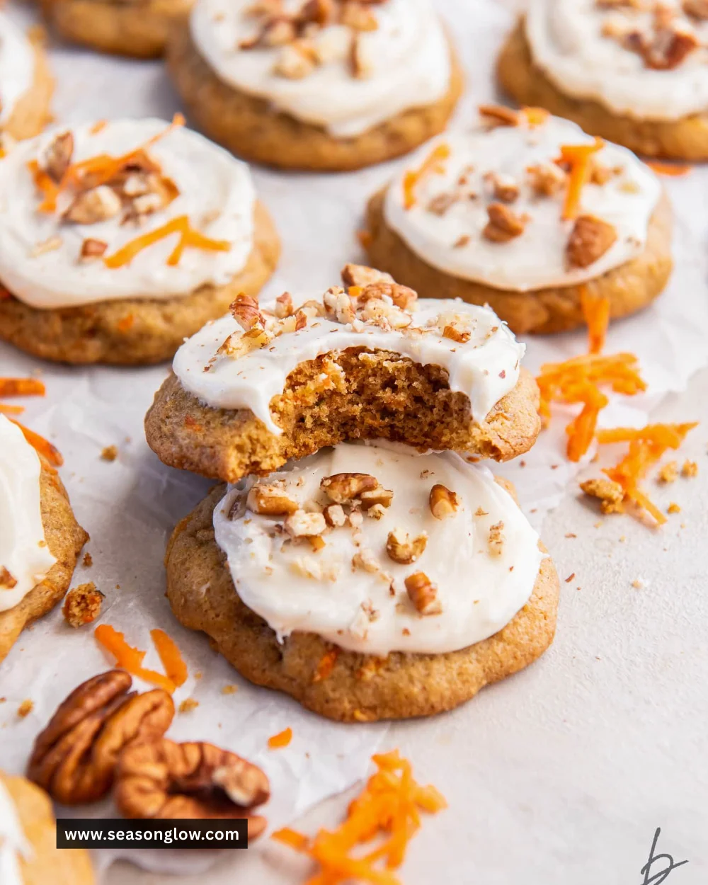 Delicious carrot cake cookies on a plate with a glass of milk