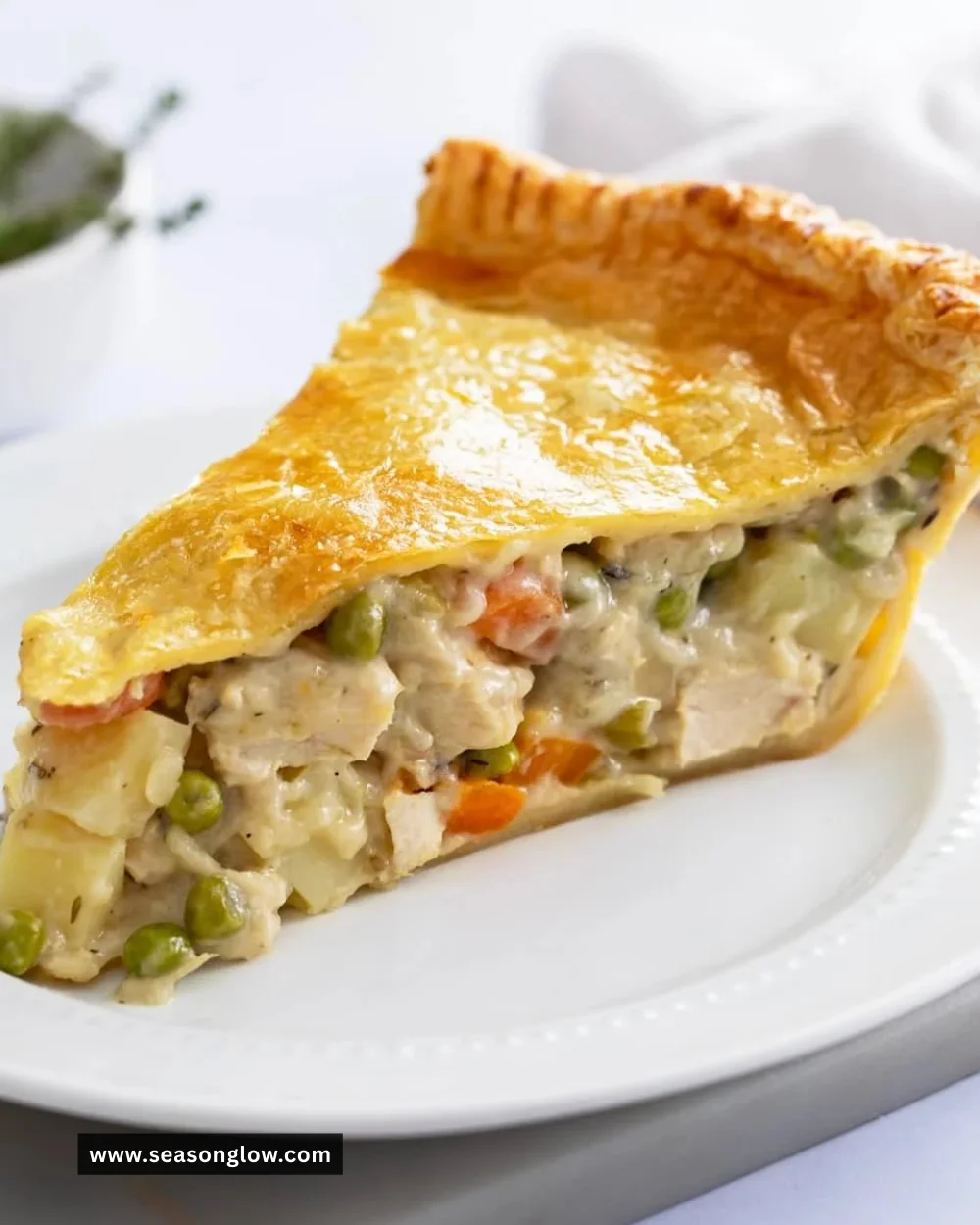 Homemade Chicken Pot Pie with flaky crust and fresh vegetables