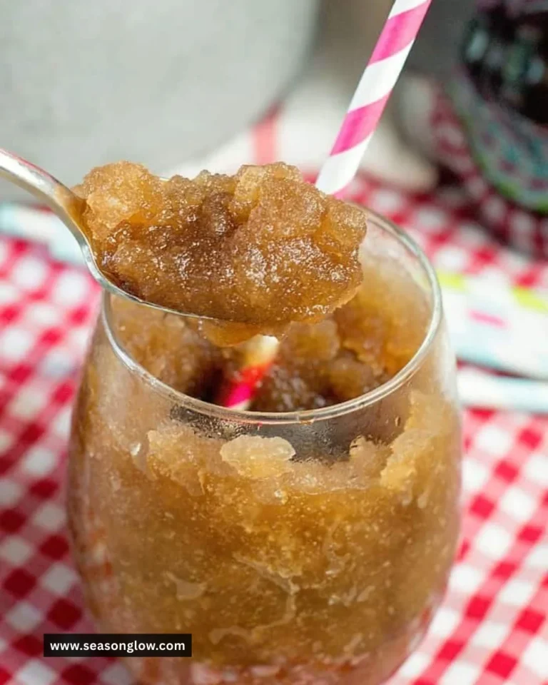 Delicious Diet Coke Slushie in a colorful cup with ice on top