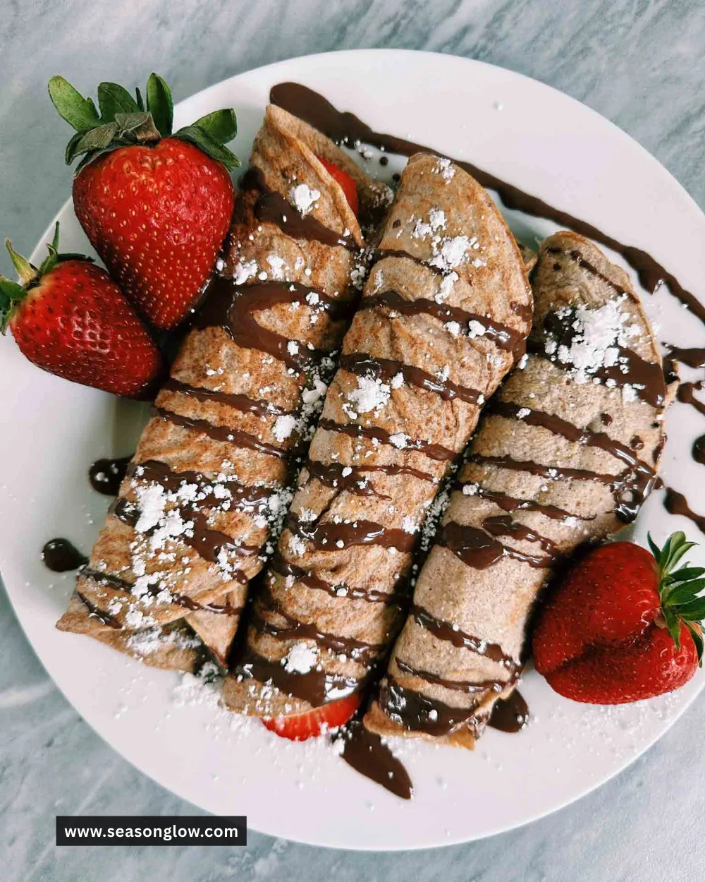 Healthy homemade crepes filled with fresh fruits and yogurt
