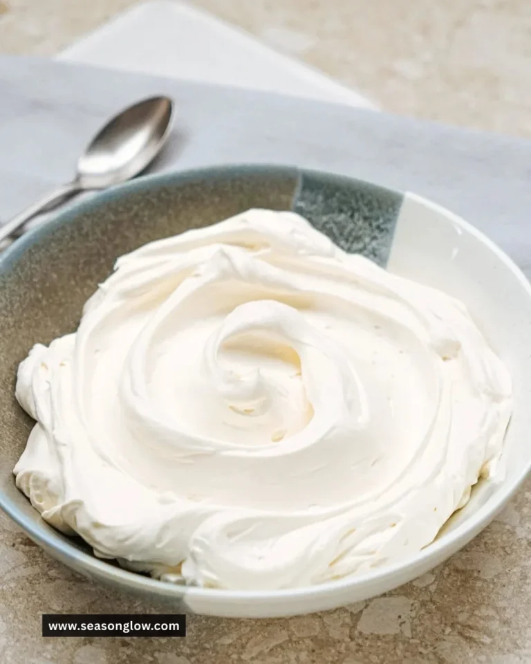 Creamy no-bake cheesecake filling in a mixing bowl