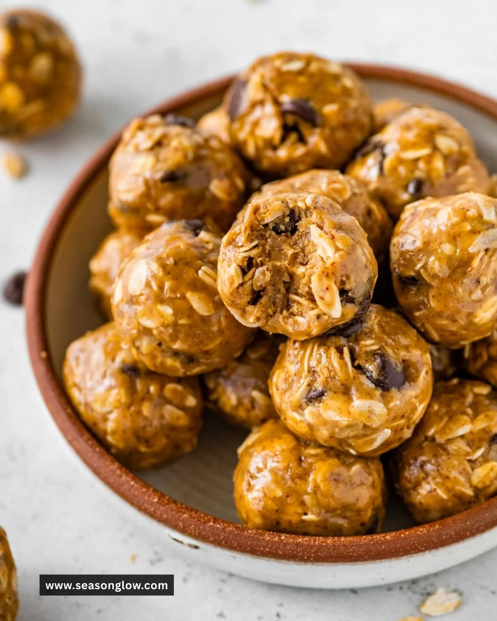 Delicious no-bake energy balls made with oats, nuts, and honey.