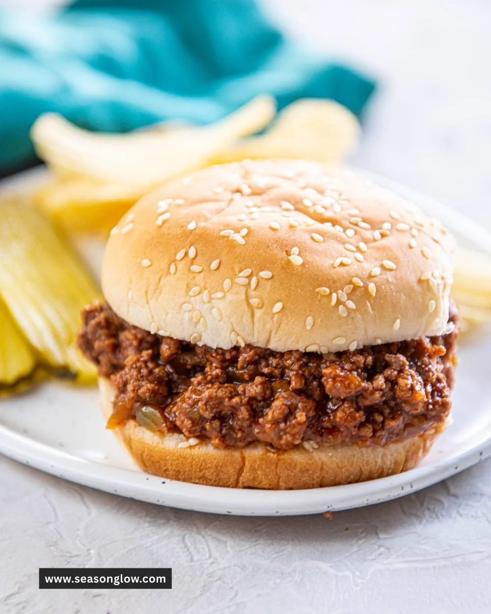 Delicious Sloppy Joe served on a bun with toppings