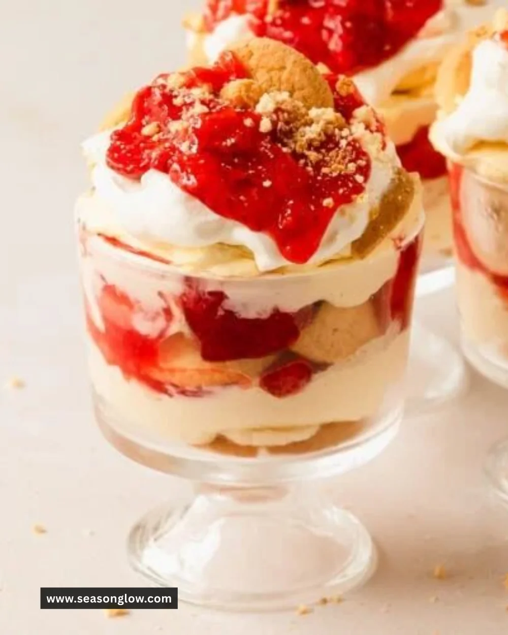 Delicious Strawberry Banana Pudding served in a glass bowl with fresh strawberries and bananas.