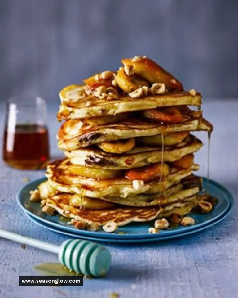 Delicious stuffed pancakes with fruit filling served on a plate.