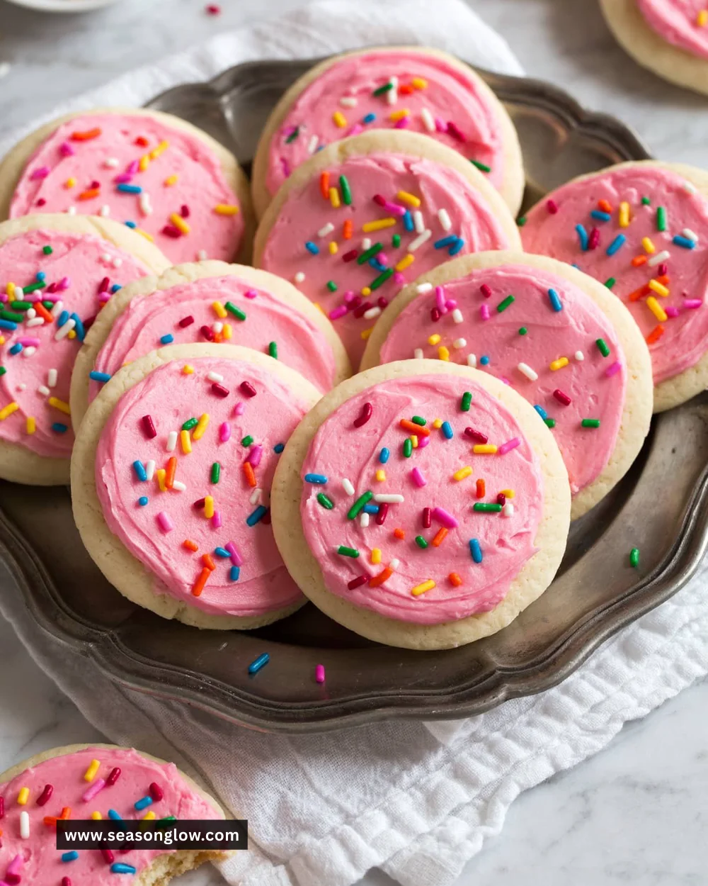 Delicious sugar cookie frosting on freshly baked cookies