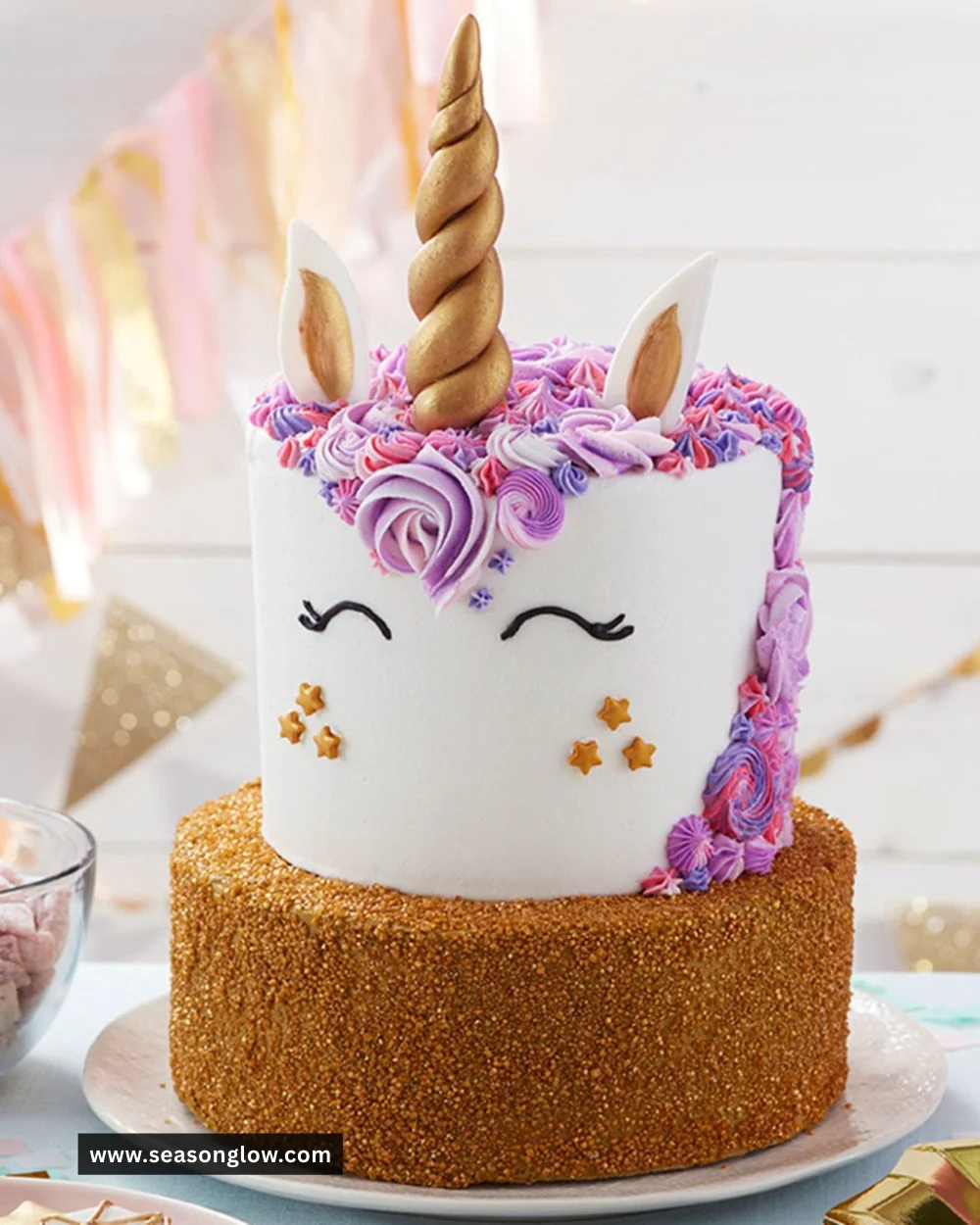 Colorful and whimsical unicorn cake decorated with fondant and sprinkles.