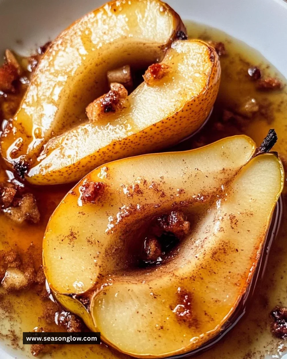 Delicious baked pears drizzled with cinnamon honey for a sweet dessert.