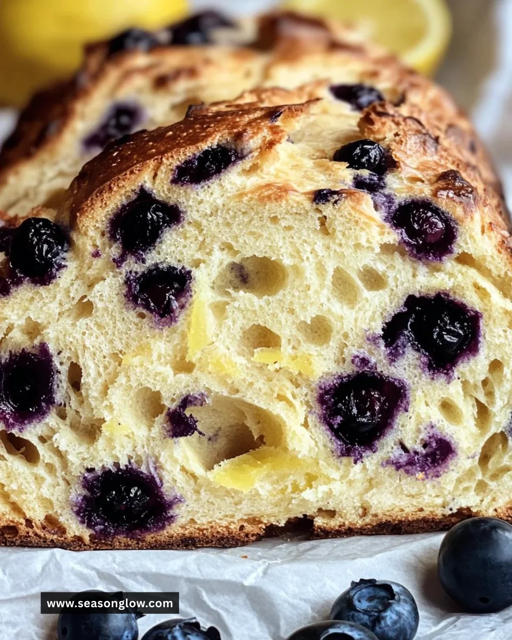 Freshly baked lemon blueberry sourdough bread with a golden crust