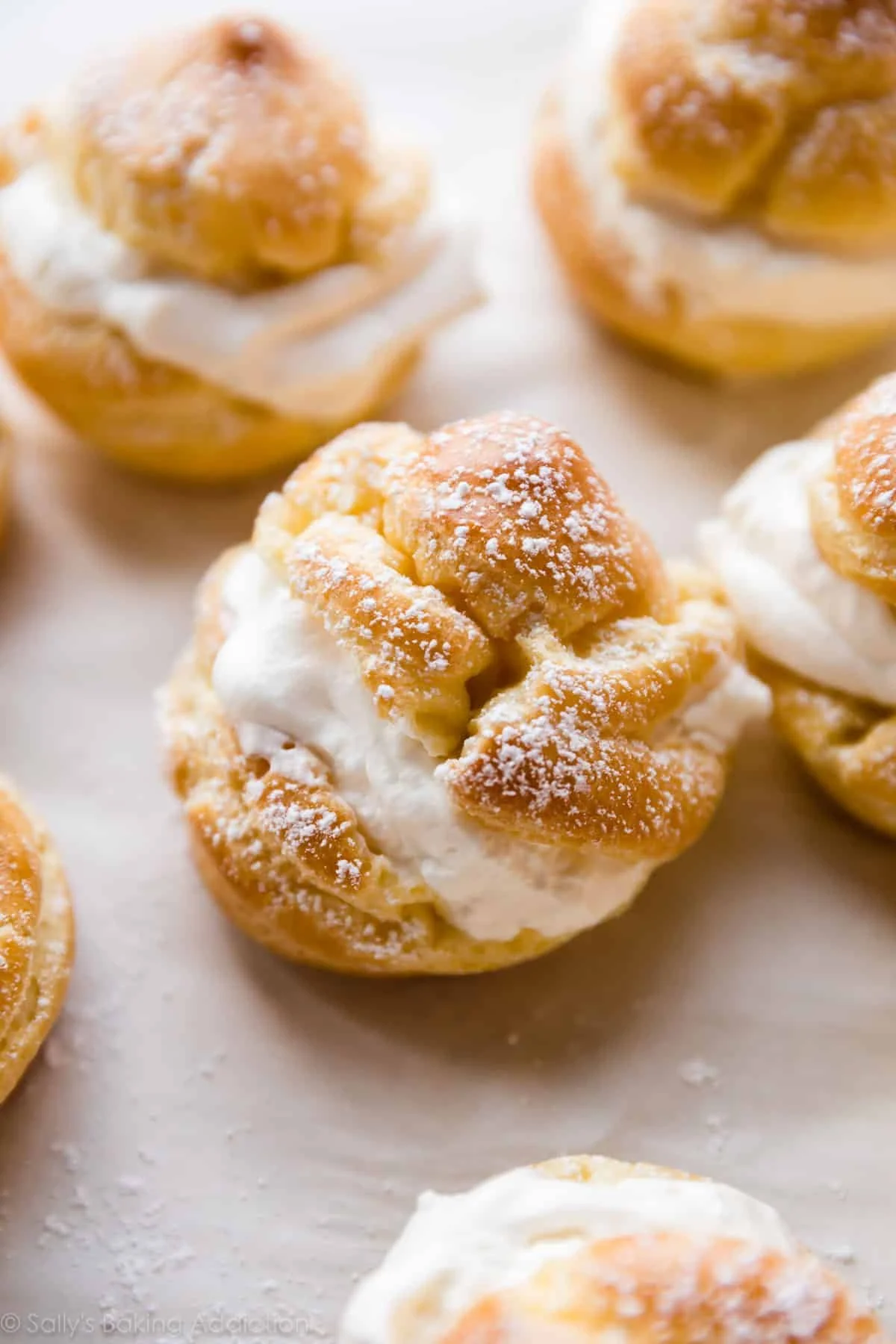 Delicious choux pastry desserts including éclairs and cream puffs.