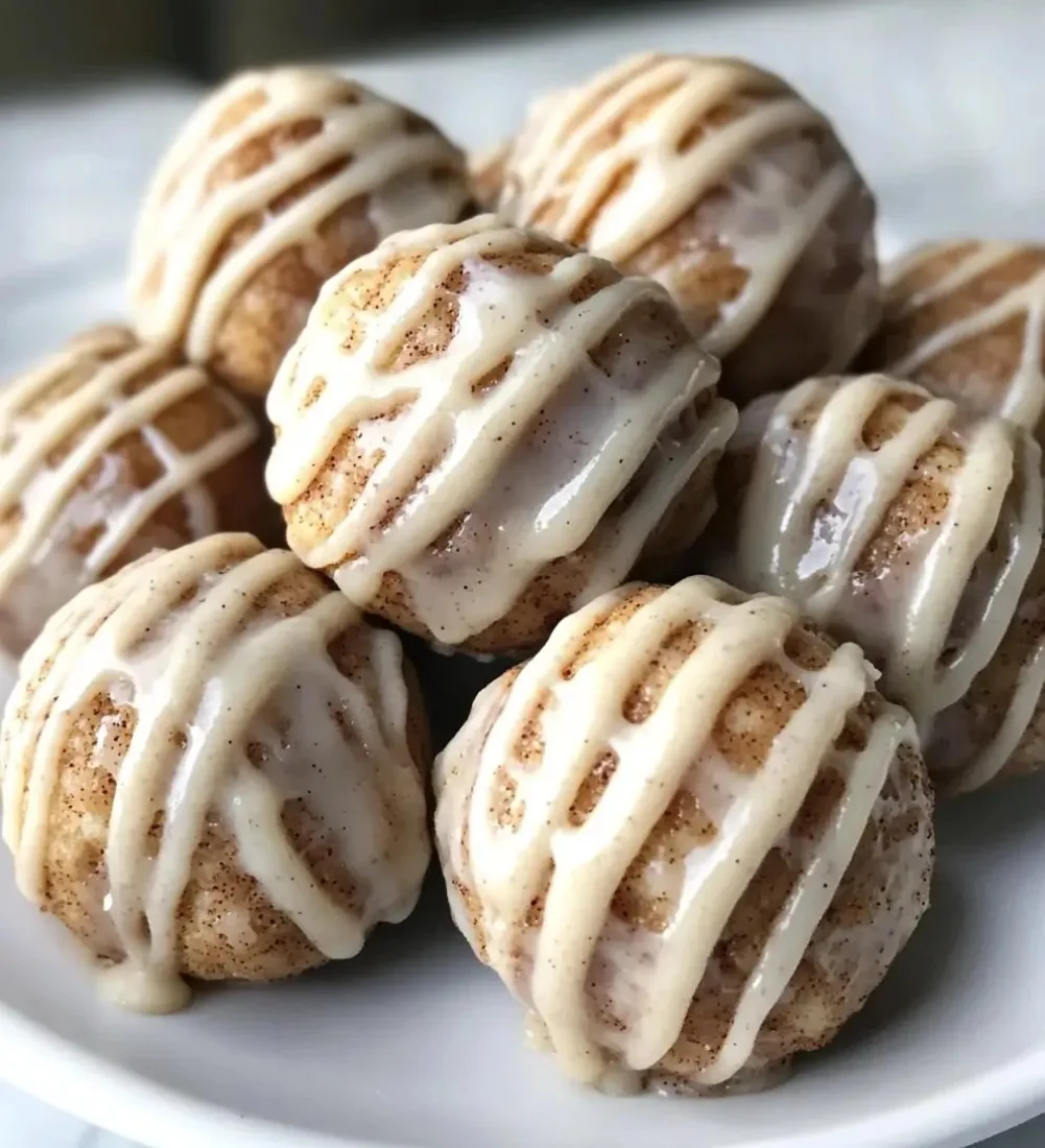 Delicious homemade cinnamon roll protein bites ready to enjoy as a nutritious snack.
