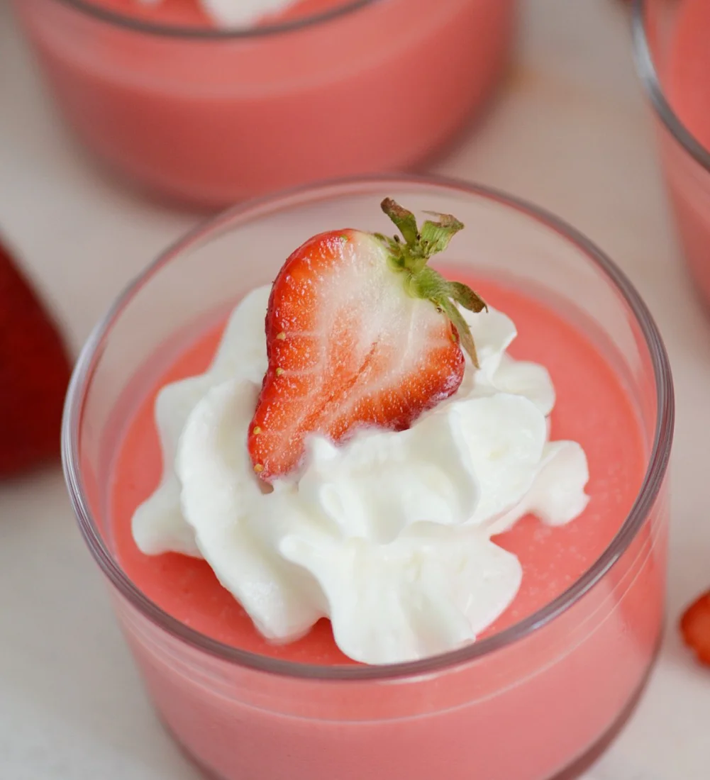 Bowl of easy strawberry jello with Greek yogurt and fresh strawberries