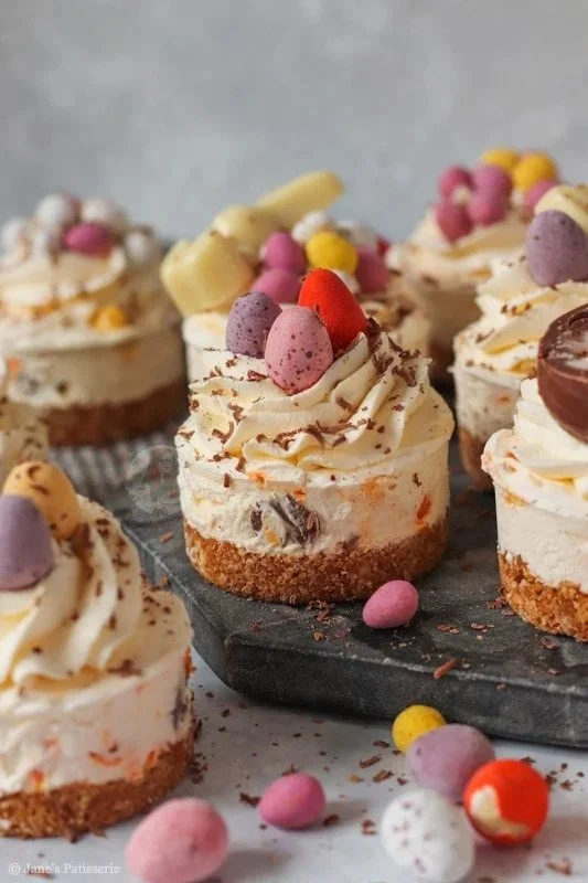 Delicious mini Easter cheesecakes decorated with colorful toppings