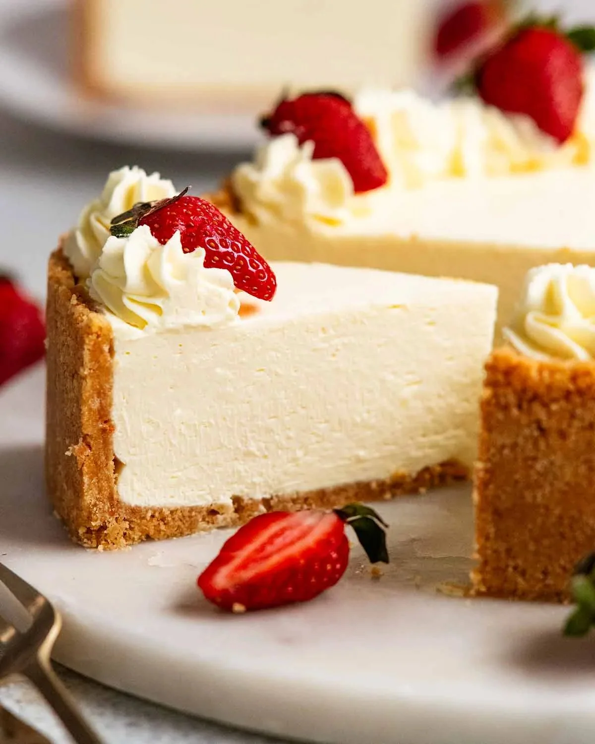 Delicious no bake cheesecake topped with fresh strawberries