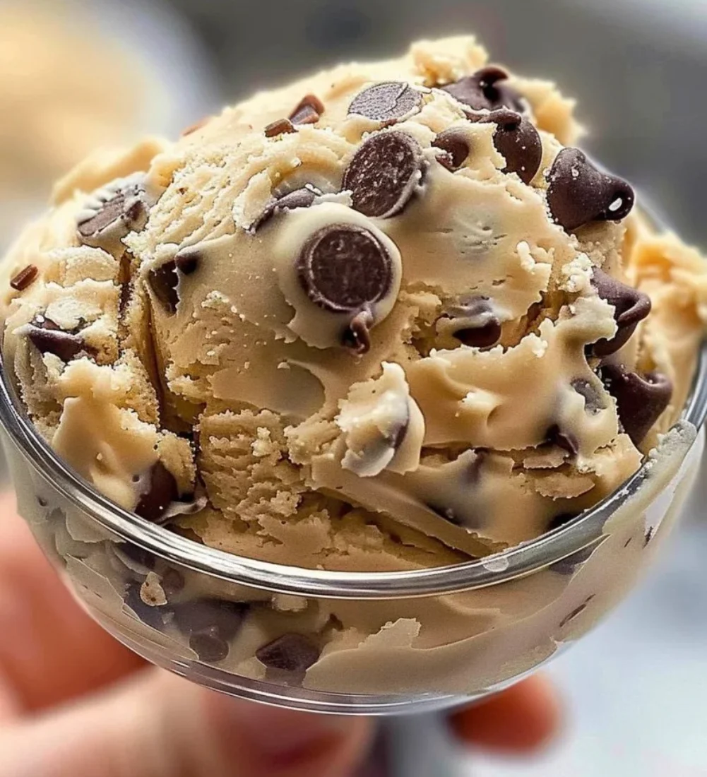 Bowl of homemade protein cookie dough with protein powder and chocolate chips