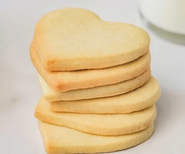 Decorated cut out sugar cookies on a festive platter
