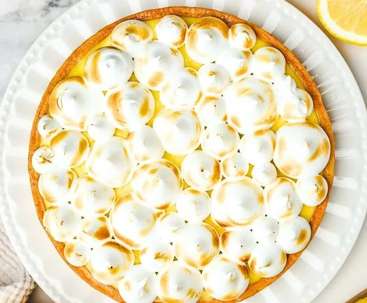 Delicious French Lemon Meringue Tart with gold-brown meringue topping