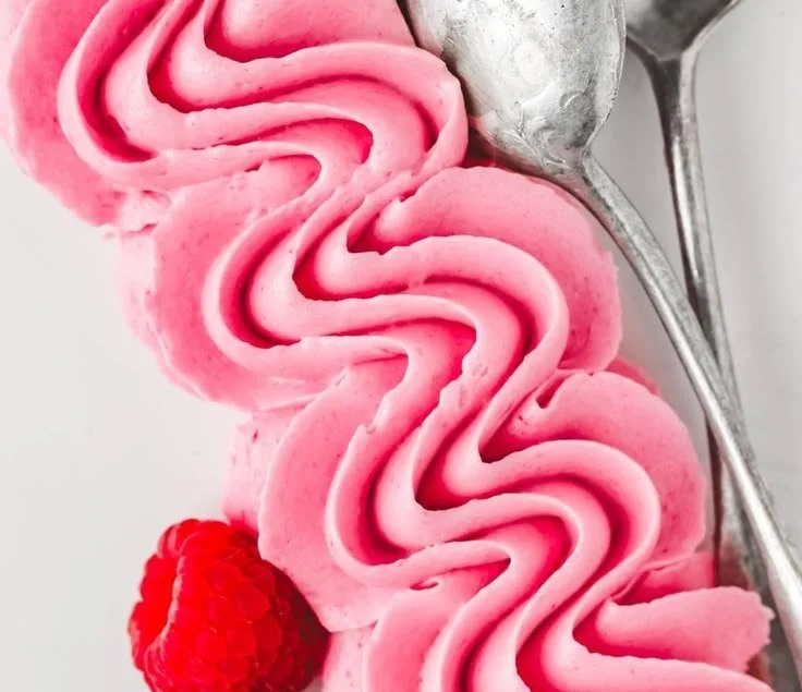 Delicious Raspberry Buttercream Frosting on a cupcake