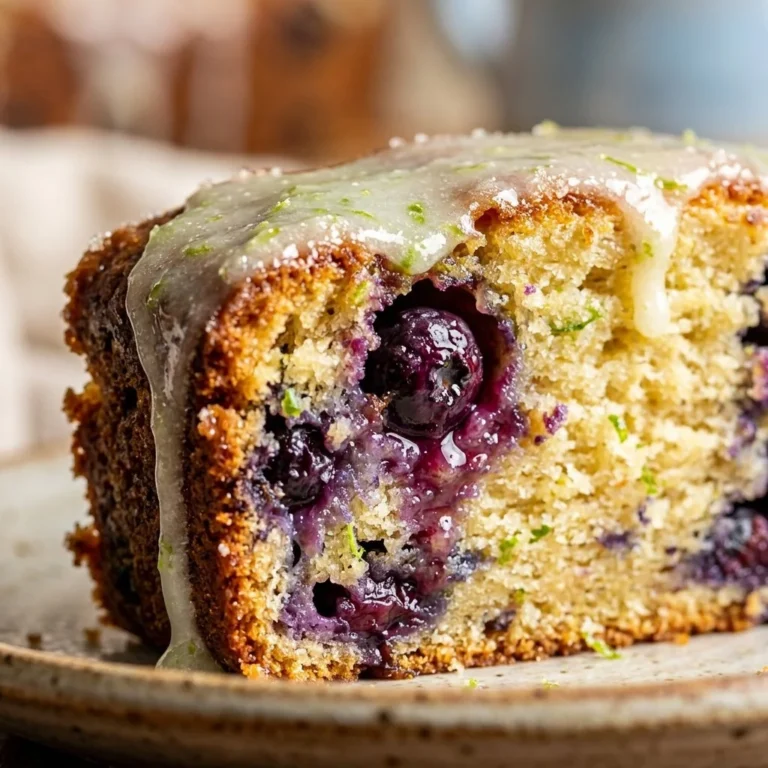 Blueberry lime pound cake topped with fresh blueberries and lime zest